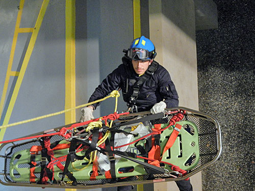 Photo caption: Hofstra North-Shore-LIJ School of Medicine medical student Michael Spigner takes part in a drill with the Manhasset-Lakeville Fire Department.