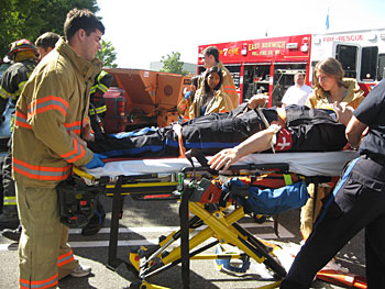 Medical students take part in an EMT training exercise that re-created a car accident with multiple victims. The training took place at the North Shore-LIJ Health System Center for Emergency Medical Services in Syosset. 