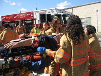 Medical students take part in an EMT training exercise that re-created a car accident with multiple victims. The training took place at the North Shore-LIJ Health System Center for Emergency Medical Services in Syosset. 